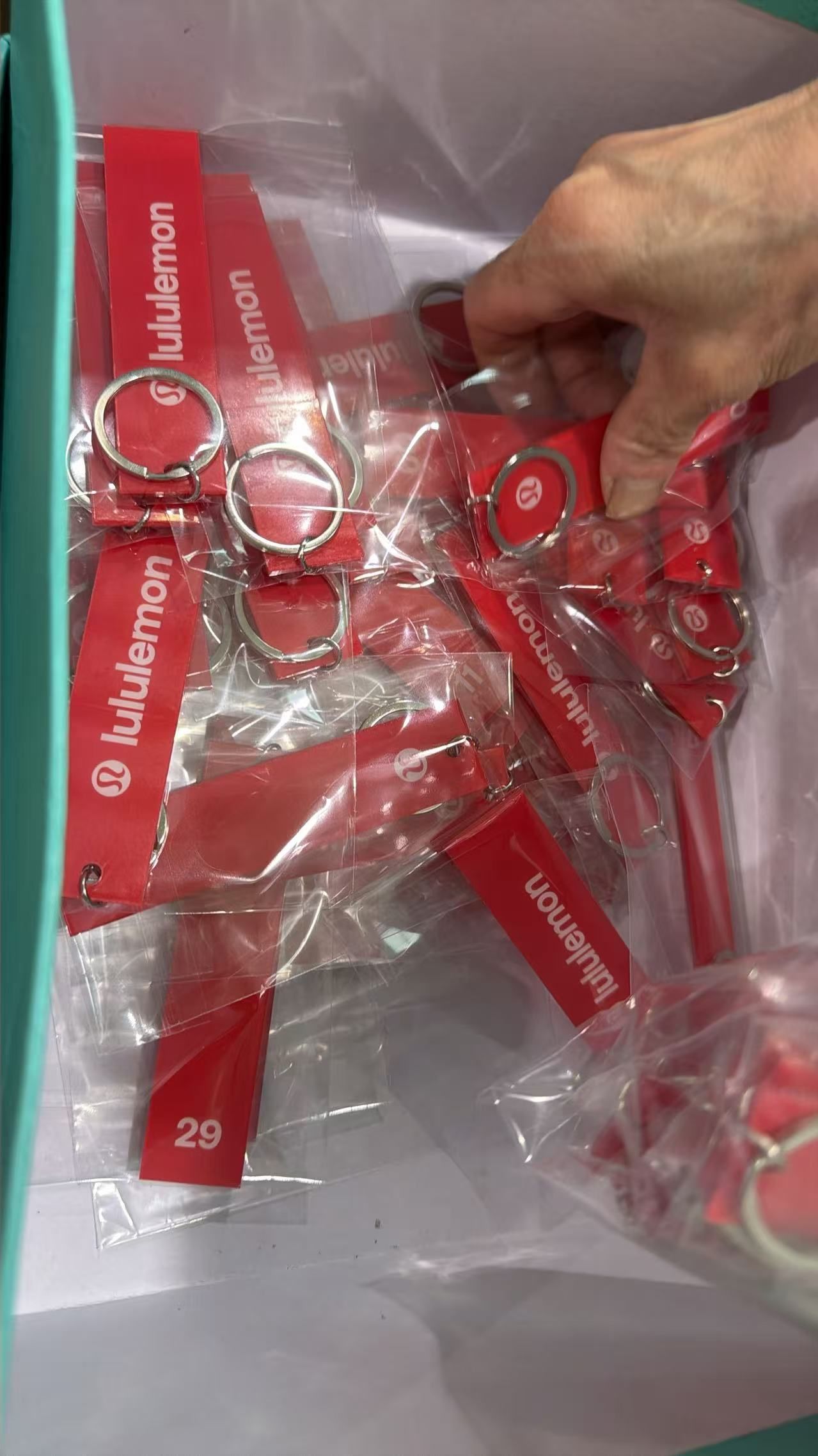 Custom full-colour acrylic keyrings, produced in bulk