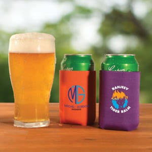 colorful branded bottle coolers placed with drink glass